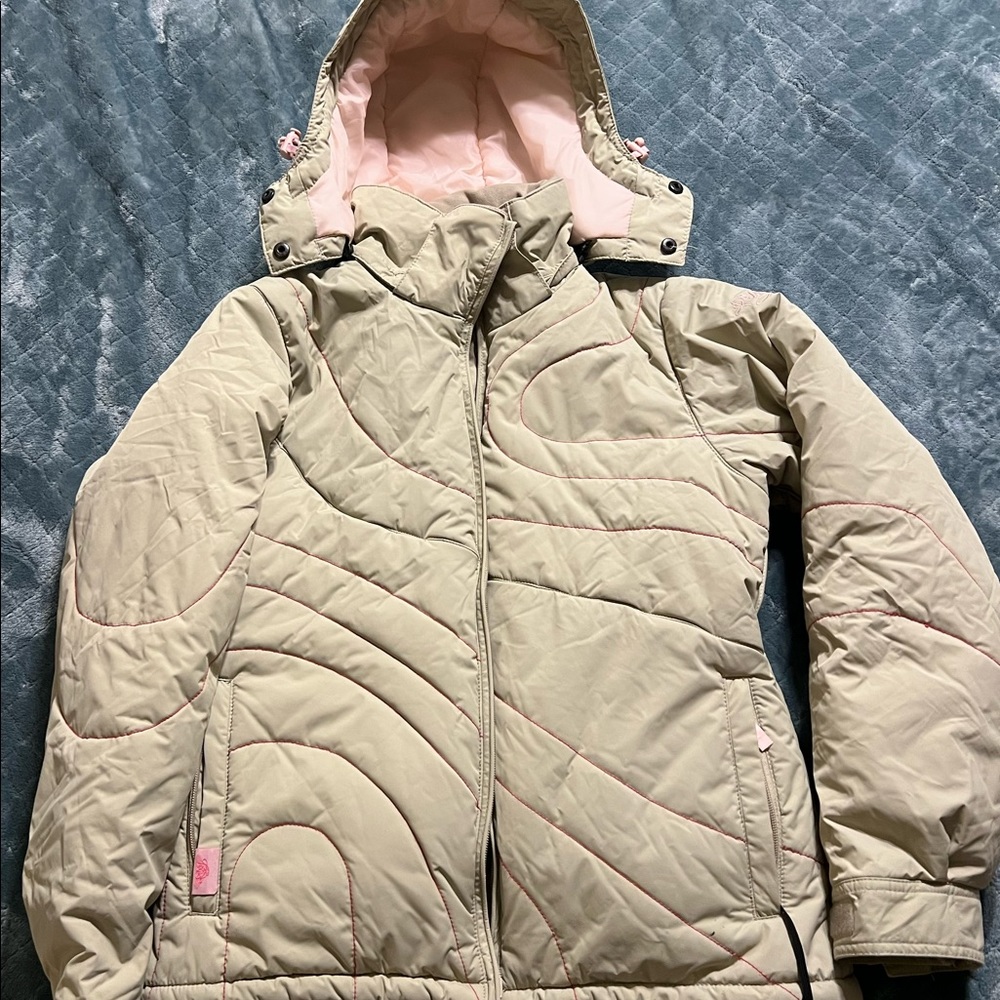 Medium, super warm ski/snow board jacket.